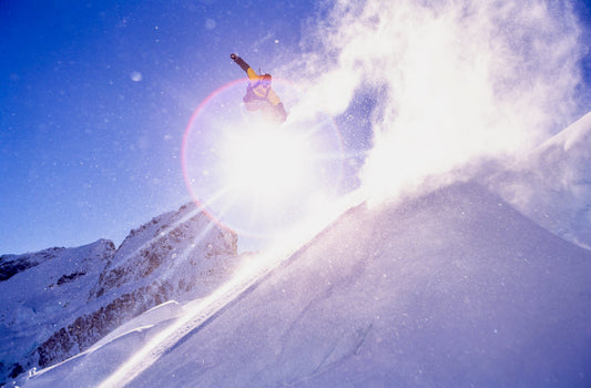 Snowboarder Marc Frank Montoya flying off a jump in New Zealand