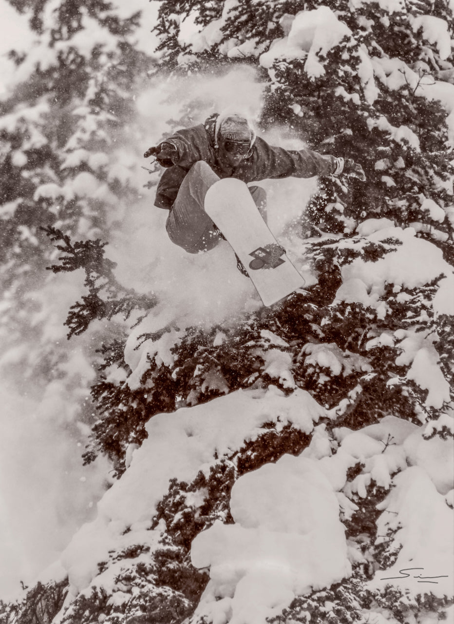 Snowboarder Marc Morisset through the Revelstoke trees