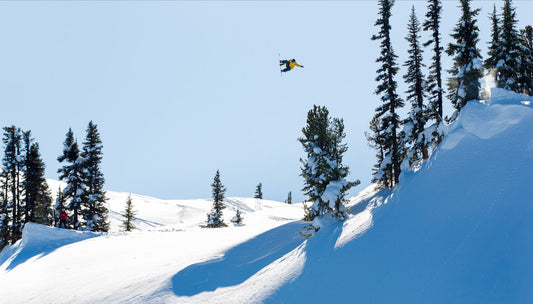 Snowboarder Torstein Horgmo flies off a giant jump 