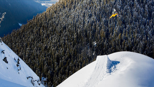 Professional Snowboarder Torstein Horgmo goes off a poppy jump 