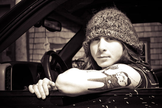 Olympic Medalist Danny Kass  looks out his car window