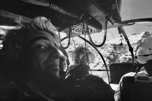 Snowboarders in helicopter over Valle Nevado, Chile