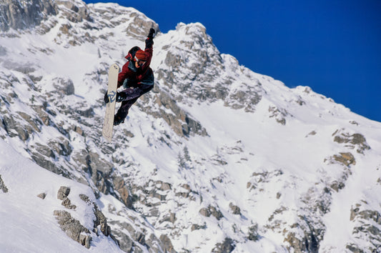 Snowboarder Craig Kelly does a frontside air at Island Lake Lodge, BC