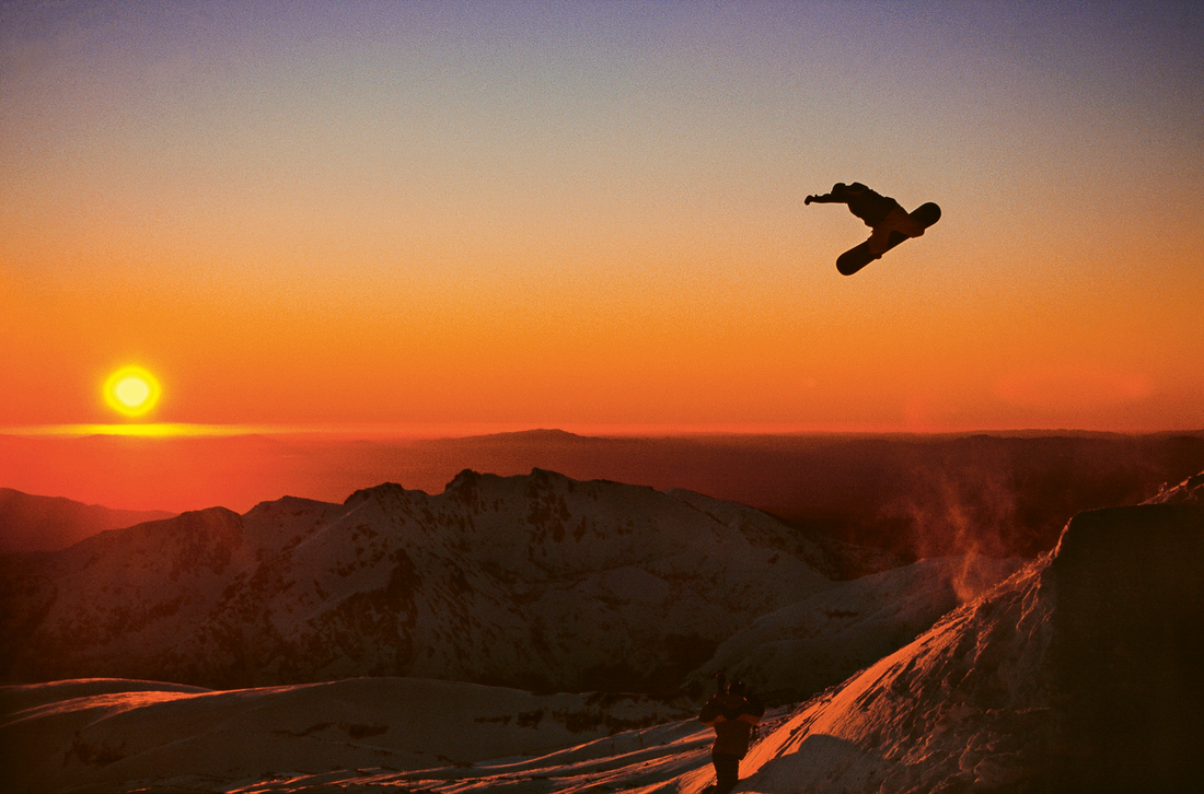 Snowboarding at sunset