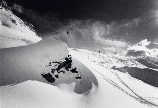 Professional snowboarder Nicolas Müller doing a method air in Corvatsch, Switzerland