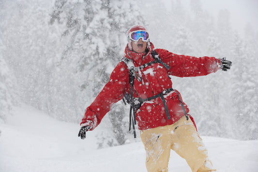 Snowboarder Hana Beaman riding powder snow 