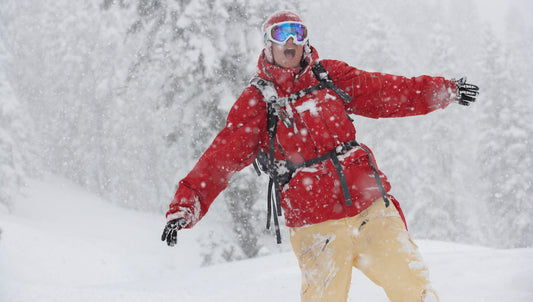 Female Snowboarder Hana Beaman riding in a snowstorm